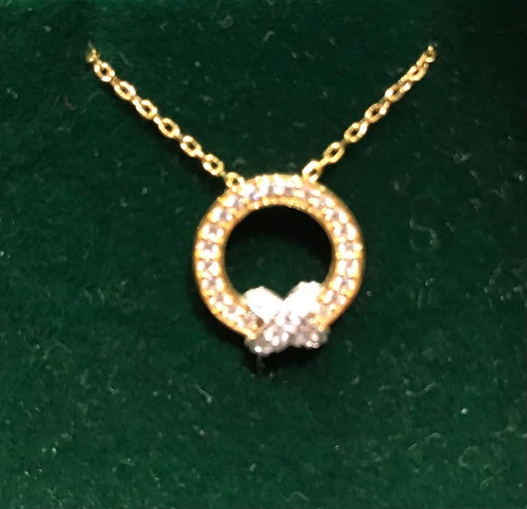 9ct gold “ring with a kiss” pendant and chain